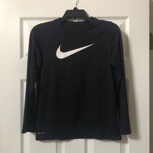 Nike Dri-Fit long sleeve youth tee shirt. Black with white swoosh logo. Good.